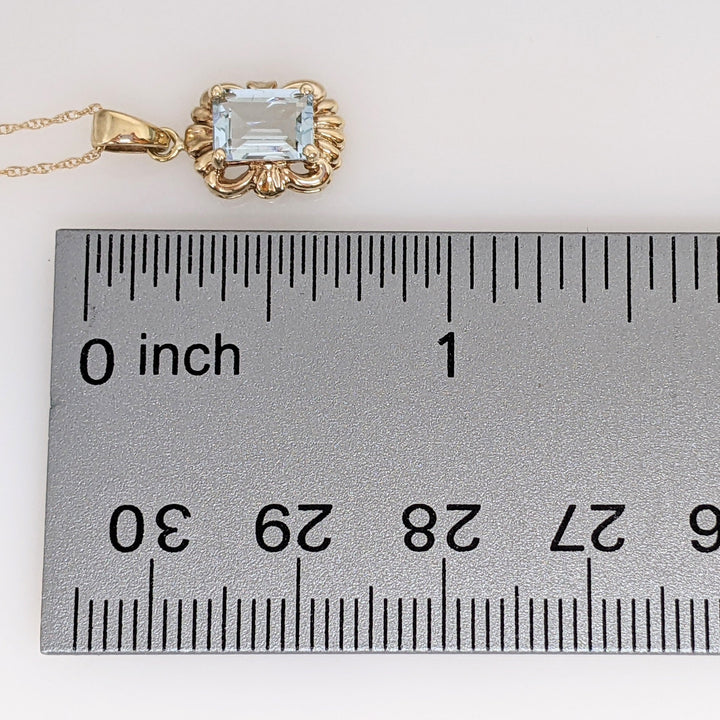 10K AQUAMARINE EMERALD CUT 5X7 WITH GOLD TRIM ESTATE PENDANT & CHAIN 1.5 GRAMS