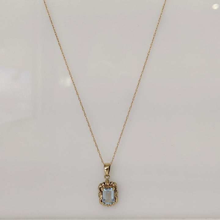 10K AQUAMARINE EMERALD CUT 5X7 WITH GOLD TRIM ESTATE PENDANT & CHAIN 1.5 GRAMS