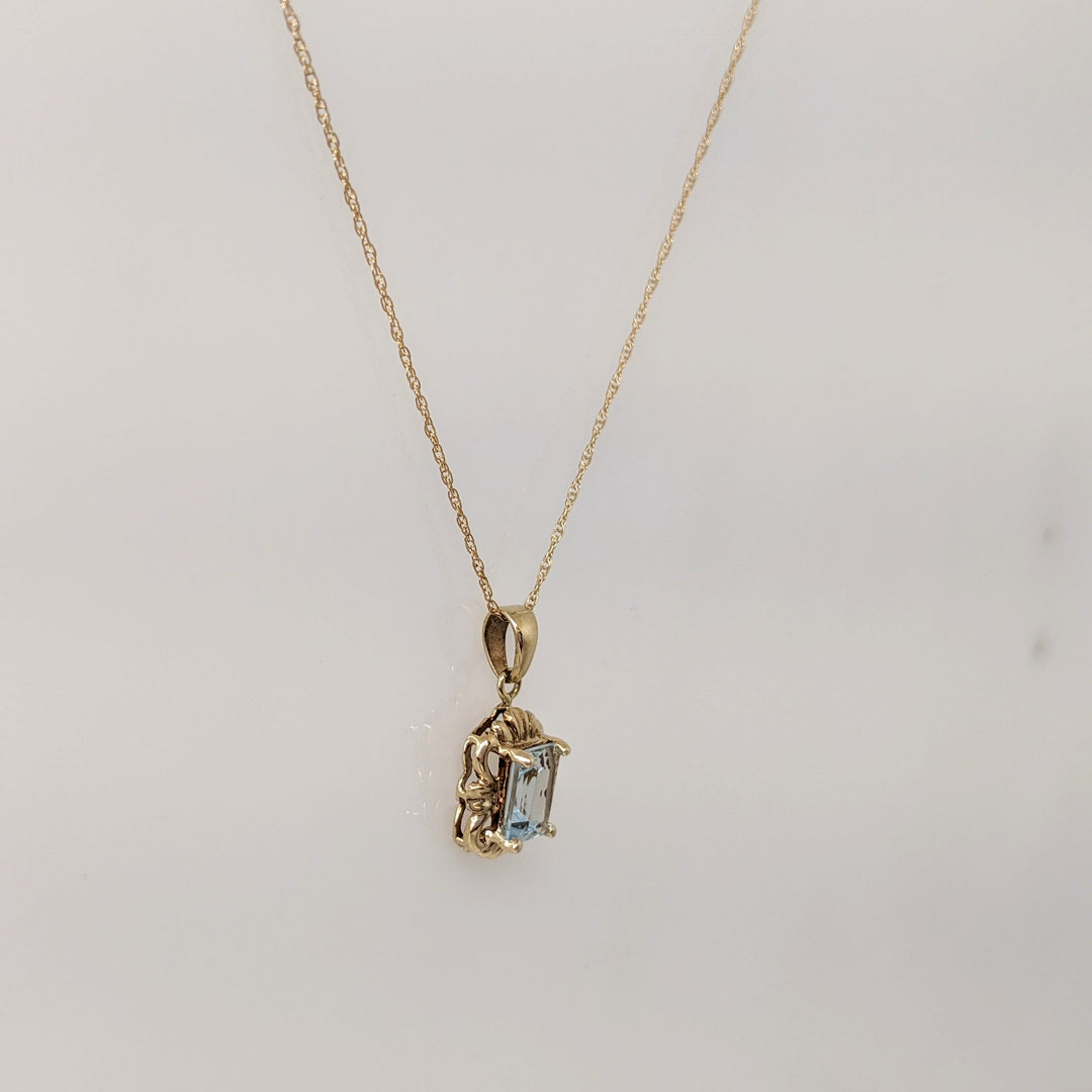 10K AQUAMARINE EMERALD CUT 5X7 WITH GOLD TRIM ESTATE PENDANT & CHAIN 1.5 GRAMS