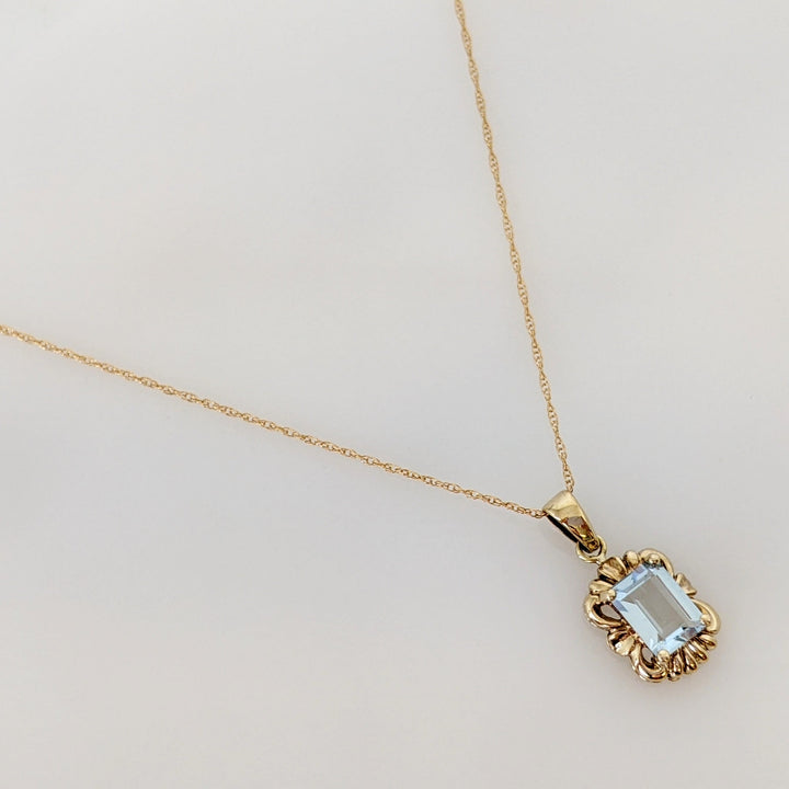 10K AQUAMARINE EMERALD CUT 5X7 WITH GOLD TRIM ESTATE PENDANT & CHAIN 1.5 GRAMS