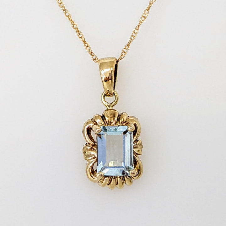 10K AQUAMARINE EMERALD CUT 5X7 WITH GOLD TRIM ESTATE PENDANT & CHAIN 1.5 GRAMS