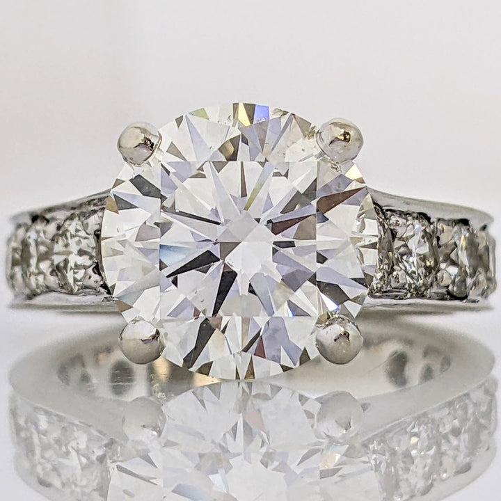 18K WHITE 3.44 CARAT TOTAL SI1 L DIAMOND ROUND WITH 1.32 CARAT TOTAL WEIGHT SI H (14) ESTATE RING 7.0 GRAMS