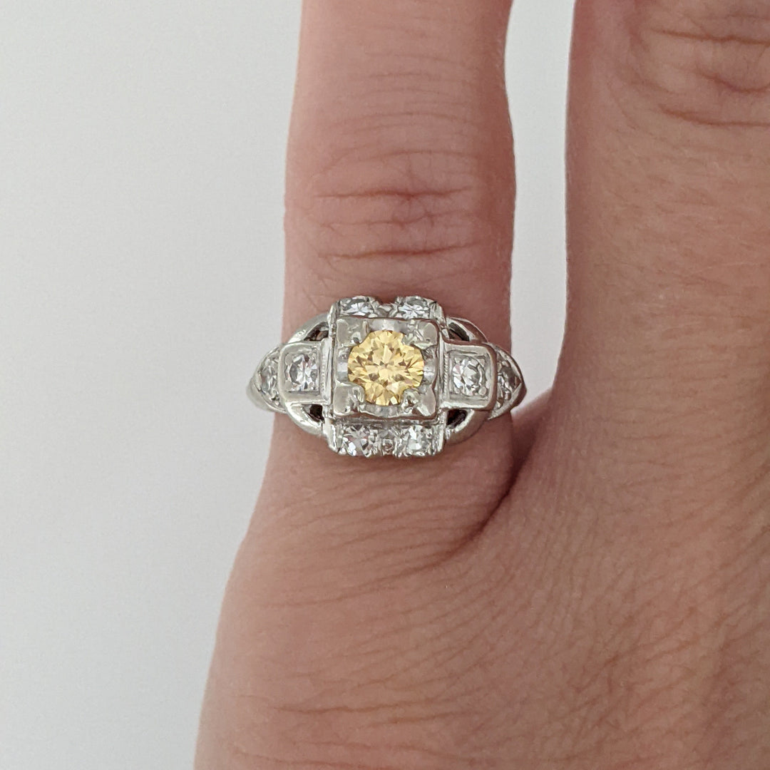 PLATINUM .56 CARAT TOTAL WEIGHT SI1-VS2 H/ YELLOW ESTATE RING 3.5 GRAMS