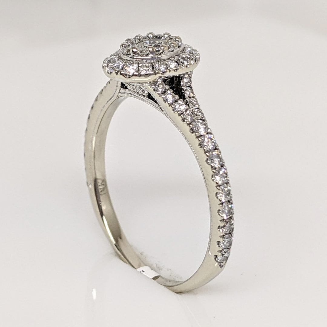 14K WHITE 1.00 CARAT TOTAL WEIGHT SI1 H DIAMOND OVAL (1) ROUND (66) NEIL LANE ESTATE RING 3.4 GRAMS