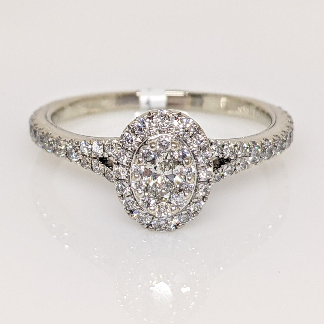14K WHITE 1.00 CARAT TOTAL WEIGHT SI1 H DIAMOND OVAL (1) ROUND (66) NEIL LANE ESTATE RING 3.4 GRAMS