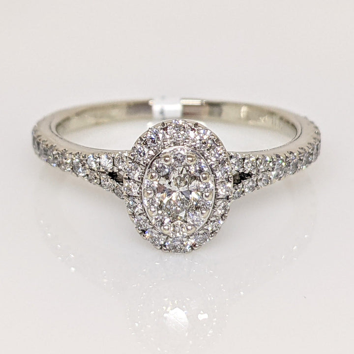 14K WHITE 1.00 CARAT TOTAL WEIGHT SI1 H DIAMOND OVAL (1) ROUND (66) NEIL LANE ESTATE RING 3.4 GRAMS