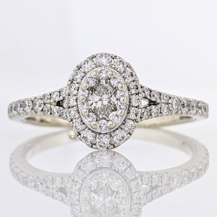 14K WHITE 1.00 CARAT TOTAL WEIGHT SI1 H DIAMOND OVAL (1) ROUND (66) NEIL LANE ESTATE RING 3.4 GRAMS