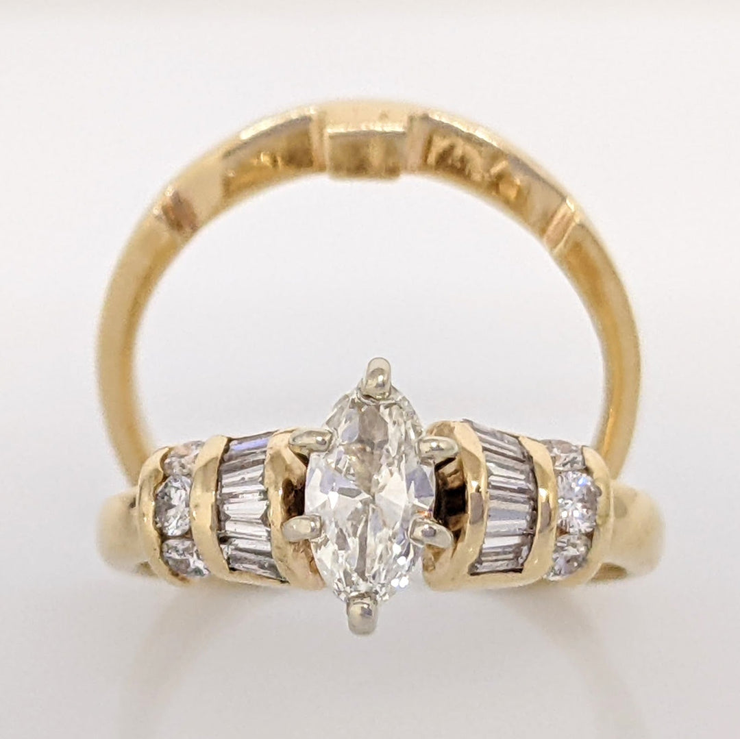 14K .71 CARAT TOTAL WEIGHT VS1-SI1 I DIAMOND MARQUISE CUT WITH (8) BAGUETTE CUT AND (6) ROUND DIAMOND ESTATE SET