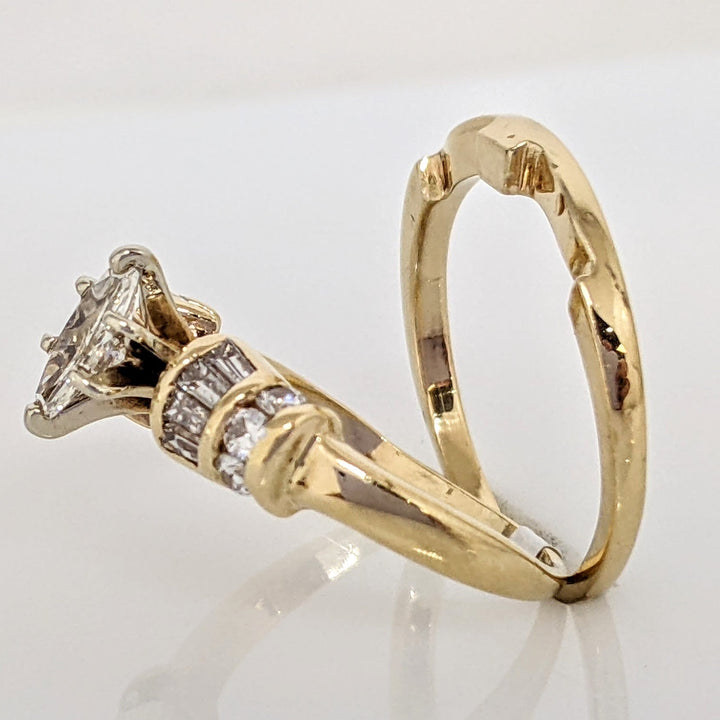 14K .71 CARAT TOTAL WEIGHT VS1-SI1 I DIAMOND MARQUISE CUT WITH (8) BAGUETTE CUT AND (6) ROUND DIAMOND ESTATE SET