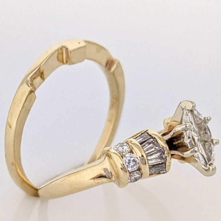 14K .71 CARAT TOTAL WEIGHT VS1-SI1 I DIAMOND MARQUISE CUT WITH (8) BAGUETTE CUT AND (6) ROUND DIAMOND ESTATE SET