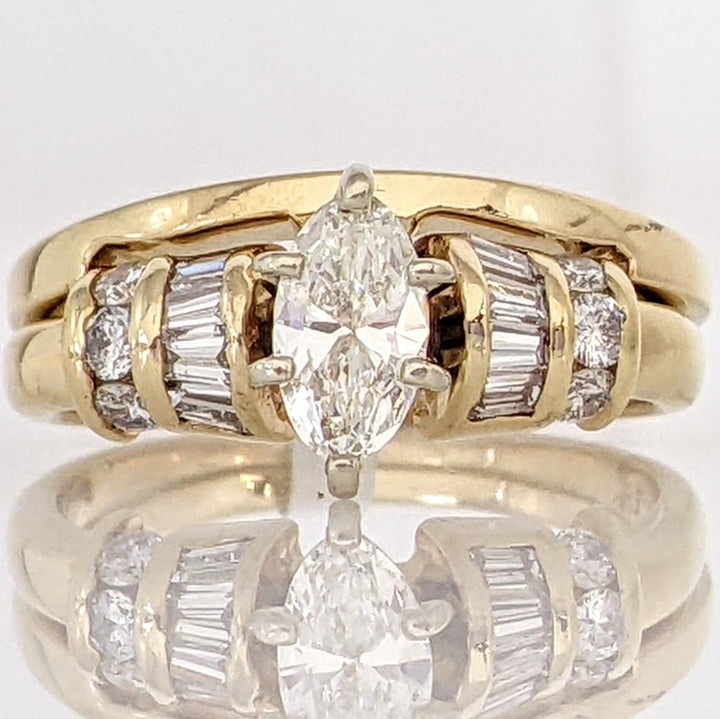 14K .71 CARAT TOTAL WEIGHT VS1-SI1 I DIAMOND MARQUISE CUT WITH (8) BAGUETTE CUT AND (6) ROUND DIAMOND ESTATE SET