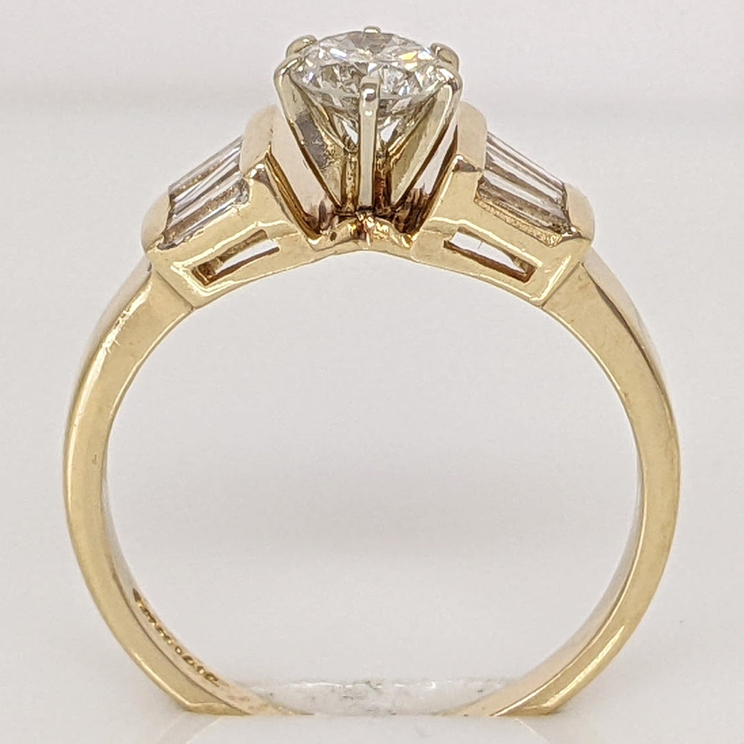 14K .71 CARAT TOTAL WEIGHT I1 J DIAMOND ROUND WITH (6) BAGUETTE CUT ESTATE RING 2.6 GRAMS