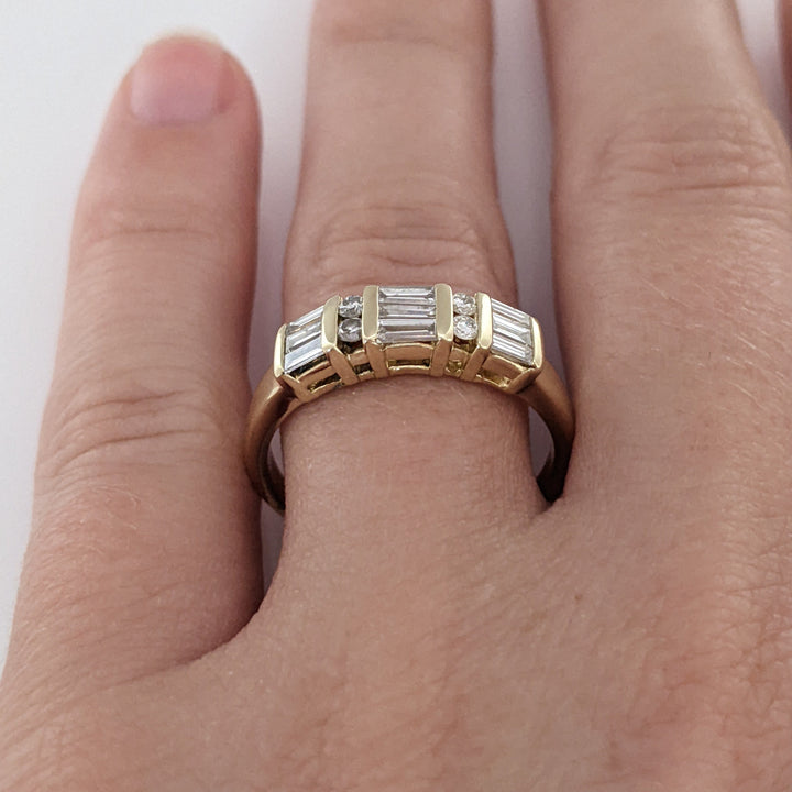 14K .84 CARAT TOTAL WEIGHT SI1 H DIAMOND ROUND (4) BAGUETTE CUT (9) ESTATE BAND 3.5 GRAMS