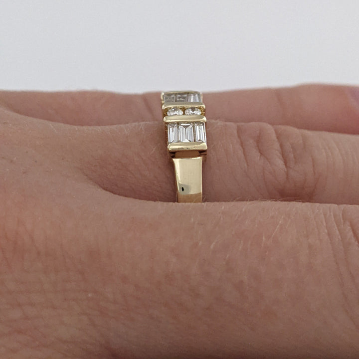 14K .84 CARAT TOTAL WEIGHT SI1 H DIAMOND ROUND (4) BAGUETTE CUT (9) ESTATE BAND 3.5 GRAMS