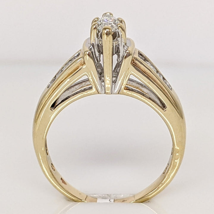 14K .57 CARAT TOTAL WEIGHT SI2 F DIAMOND MARQUISE CUT WITH (4) ROUND AND (4) BAGUETTE CUT ESTATE RING 3.9 GRAMS