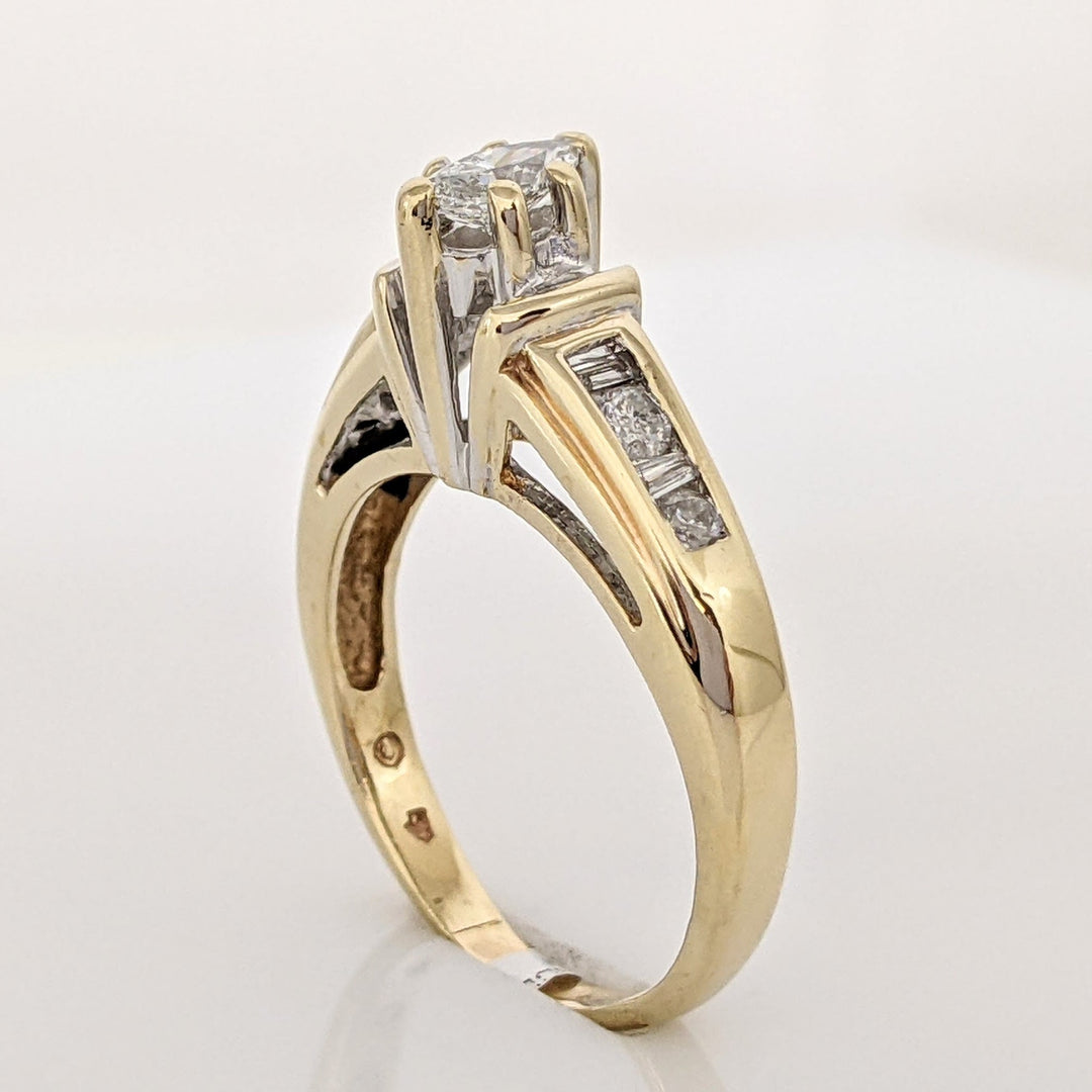 14K .57 CARAT TOTAL WEIGHT SI2 F DIAMOND MARQUISE CUT WITH (4) ROUND AND (4) BAGUETTE CUT ESTATE RING 3.9 GRAMS