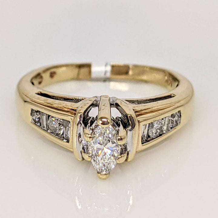14K .57 CARAT TOTAL WEIGHT SI2 F DIAMOND MARQUISE CUT WITH (4) ROUND AND (4) BAGUETTE CUT ESTATE RING 3.9 GRAMS