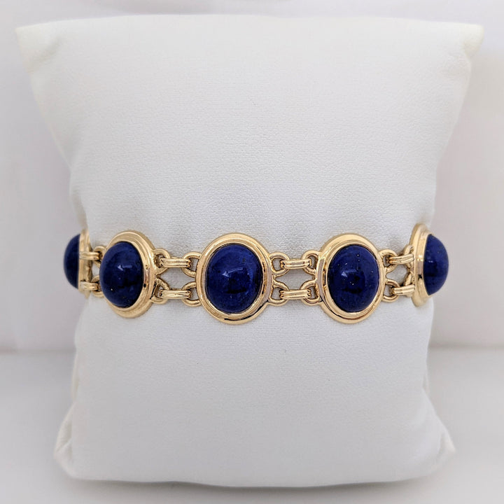 14K LAPIS CABOCHON OVAL 9X11 (11) GOLD TRIM ESTATE BRACELET/ EARRING SET 31.4 GRAMS
