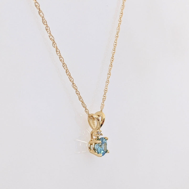 14K BLUE TOPAZ ROUND 5MM WITH MELEE ESTATE PENDANT & CHAIN 1.7 GRAMS