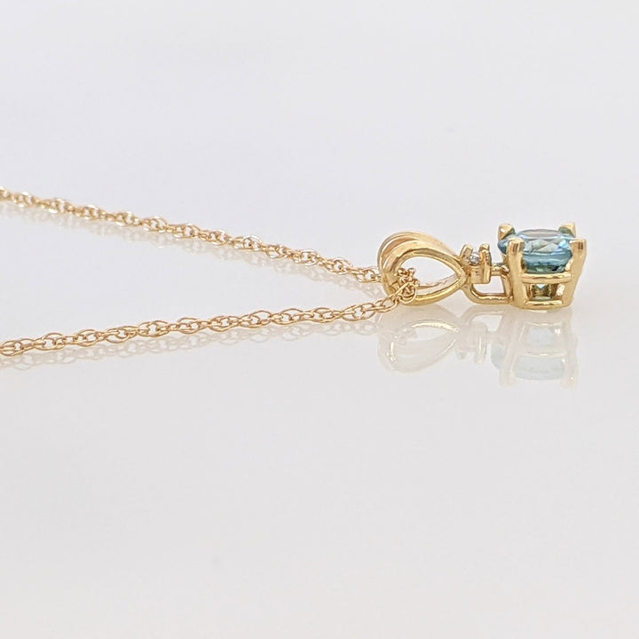 14K BLUE TOPAZ ROUND 5MM WITH MELEE ESTATE PENDANT & CHAIN 1.7 GRAMS