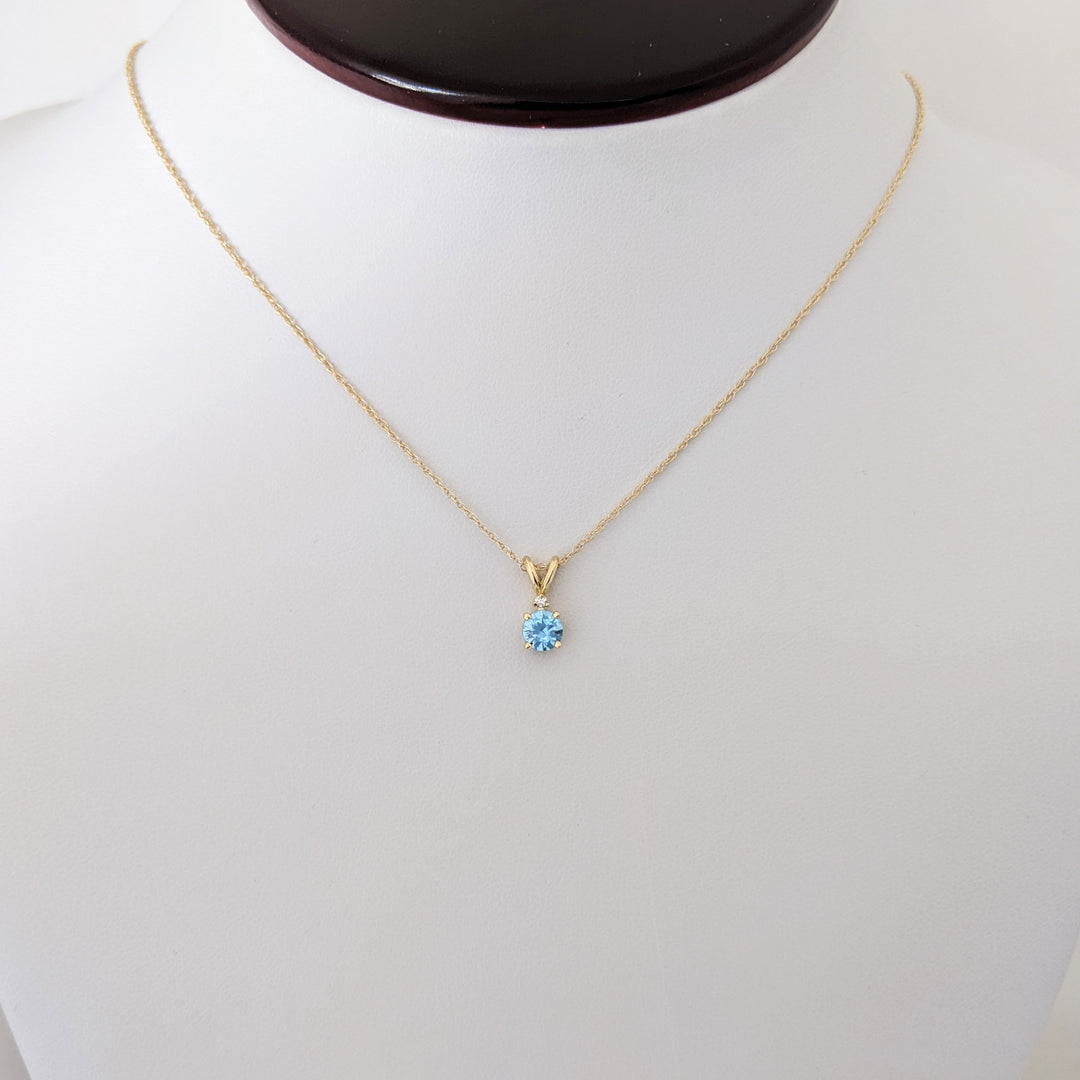 14K BLUE TOPAZ ROUND 5MM WITH MELEE ESTATE PENDANT & CHAIN 1.7 GRAMS