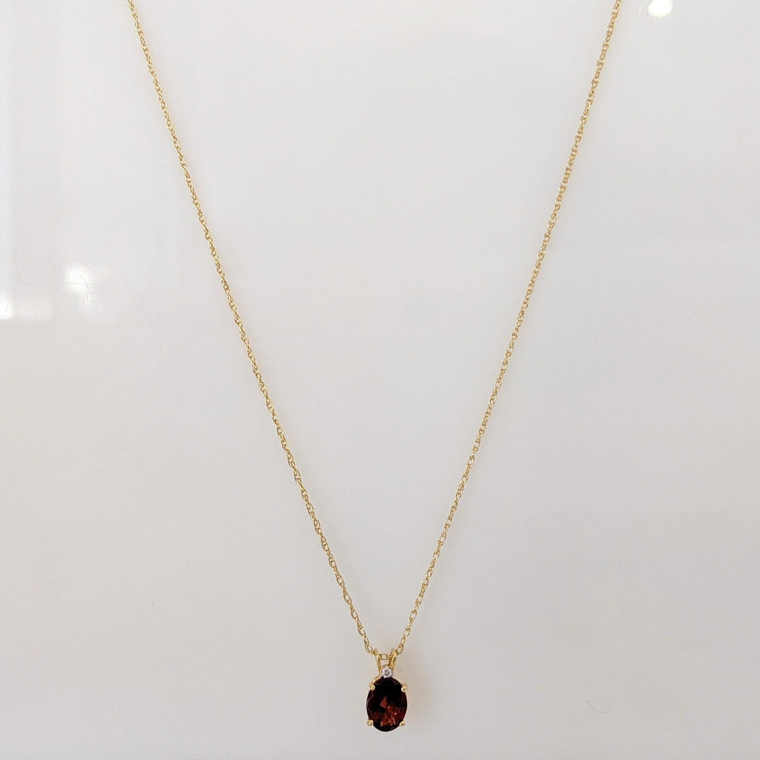 14K GARNET OVAL 6X8 WITH MELEE ESTATE PENDANT & CHAIN 1.3 GRAMS