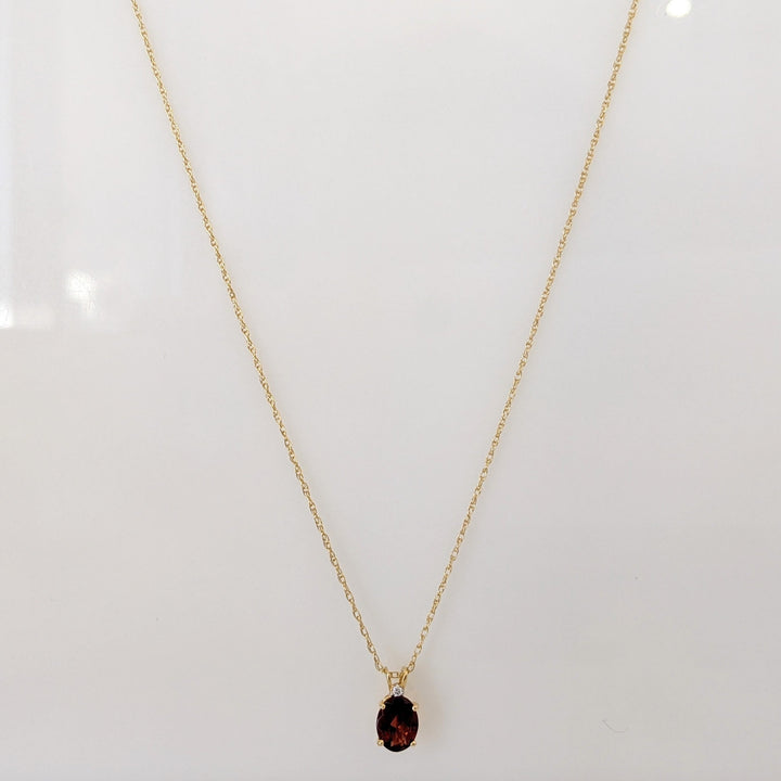 14K GARNET OVAL 6X8 WITH MELEE ESTATE PENDANT & CHAIN 1.3 GRAMS