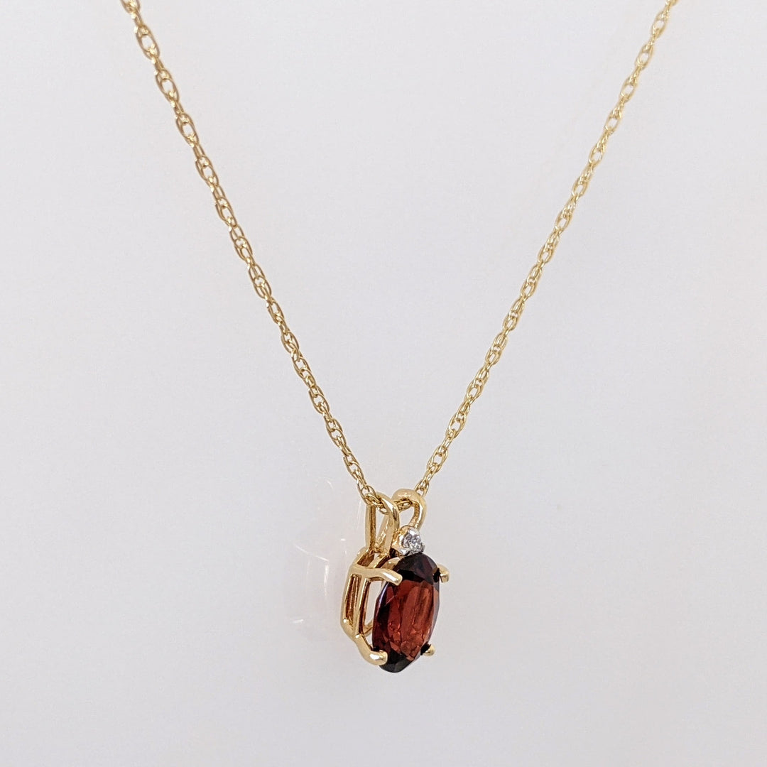 14K GARNET OVAL 6X8 WITH MELEE ESTATE PENDANT & CHAIN 1.3 GRAMS