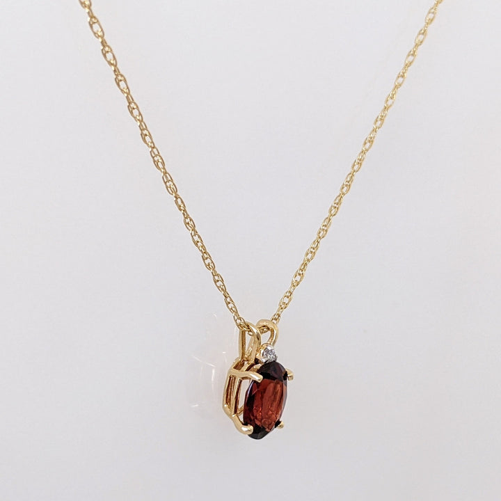 14K GARNET OVAL 6X8 WITH MELEE ESTATE PENDANT & CHAIN 1.3 GRAMS