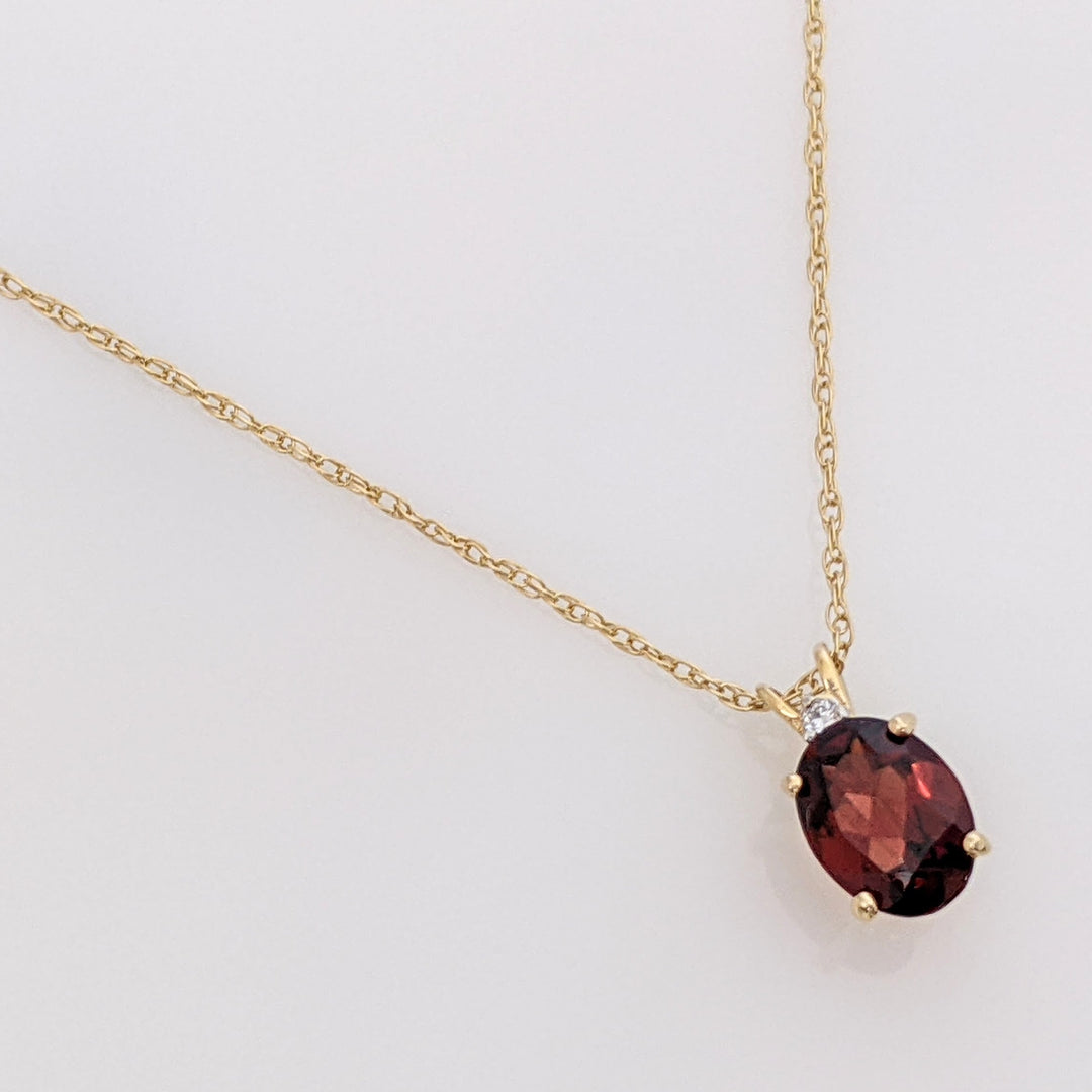 14K GARNET OVAL 6X8 WITH MELEE ESTATE PENDANT & CHAIN 1.3 GRAMS