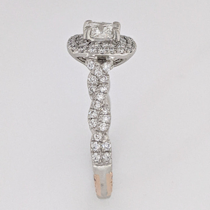 PLATINUM/18K 1.19 CARAT TOTAL WEIGHT SI1 G DIAMOND CUSHON CUT WITH (96) ROUND "PNINA" ESTATE RING 6. GRAMS