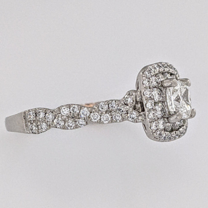 PLATINUM/18K 1.19 CARAT TOTAL WEIGHT SI1 G DIAMOND CUSHON CUT WITH (96) ROUND "PNINA" ESTATE RING 6. GRAMS