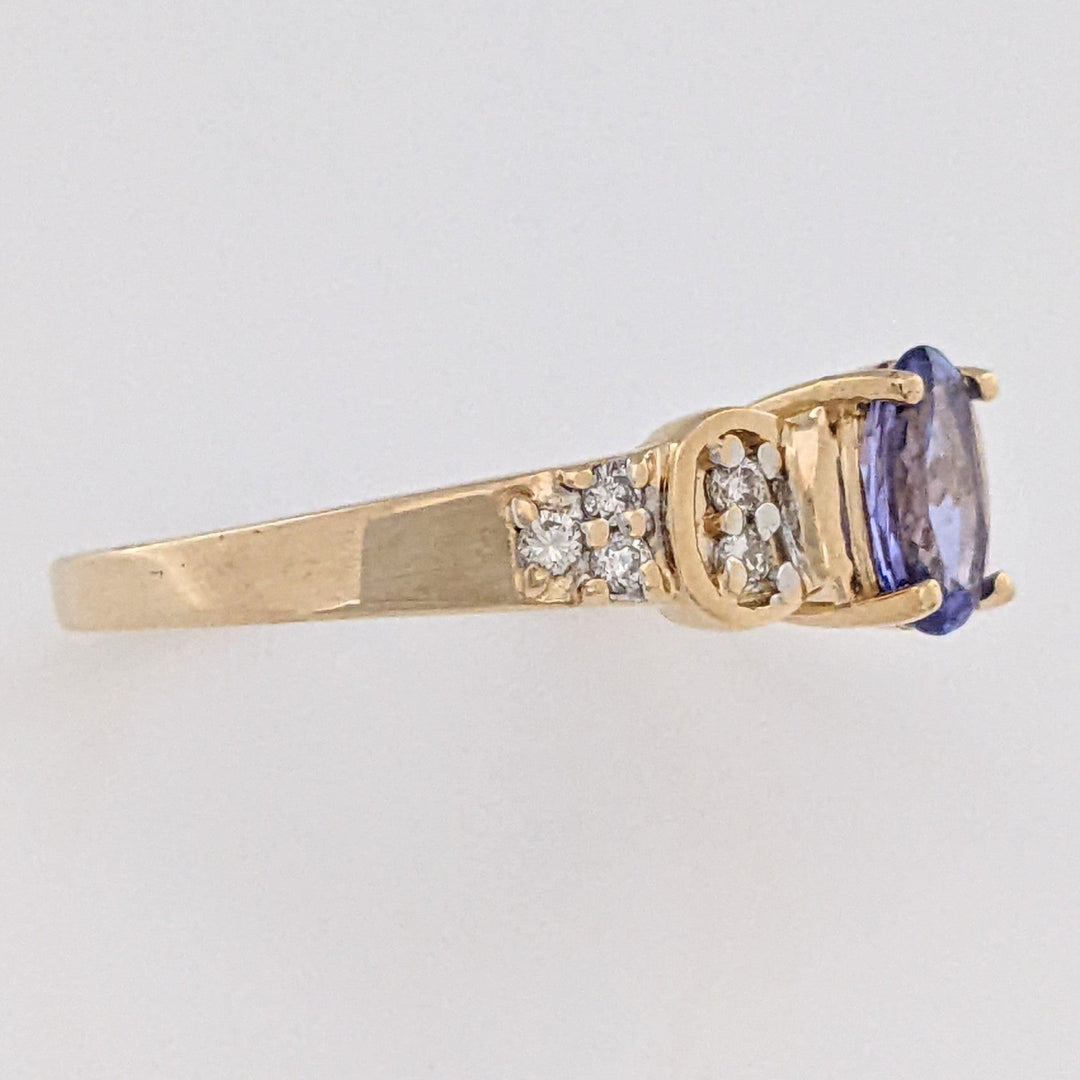 14K TANZANITE OVAL 5X7 WITH .10 DIAMOND TOTAL WEIGHT (10) ROUND ESTATE RING 3.2 GRAMS