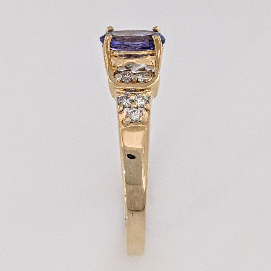 14K TANZANITE OVAL 5X7 WITH .10 DIAMOND TOTAL WEIGHT (10) ROUND ESTATE RING 3.2 GRAMS