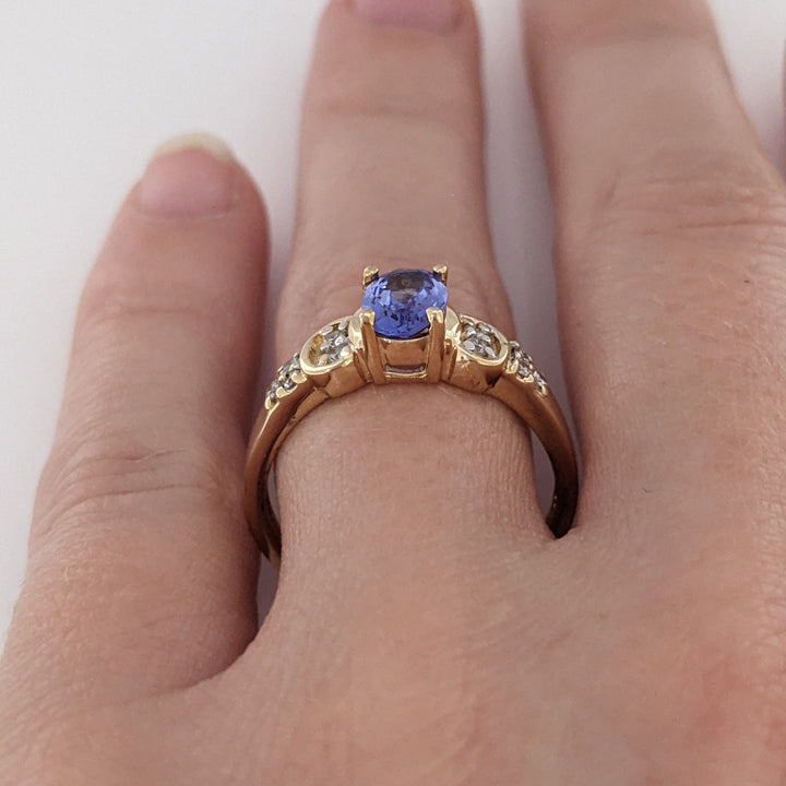 14K TANZANITE OVAL 5X7 WITH .10 DIAMOND TOTAL WEIGHT (10) ROUND ESTATE RING 3.2 GRAMS