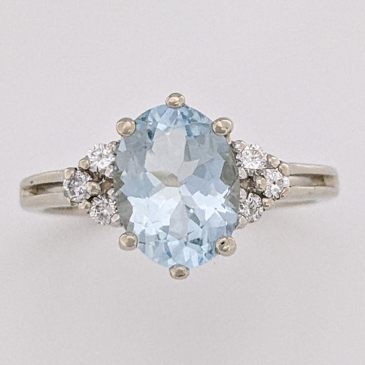 14K WHITE AQUAMARINE "AA" OVAL 7X9 WITH .12 DIAMOND TOTAL WEIGHT ESTATE RING 3.0 GRAMS