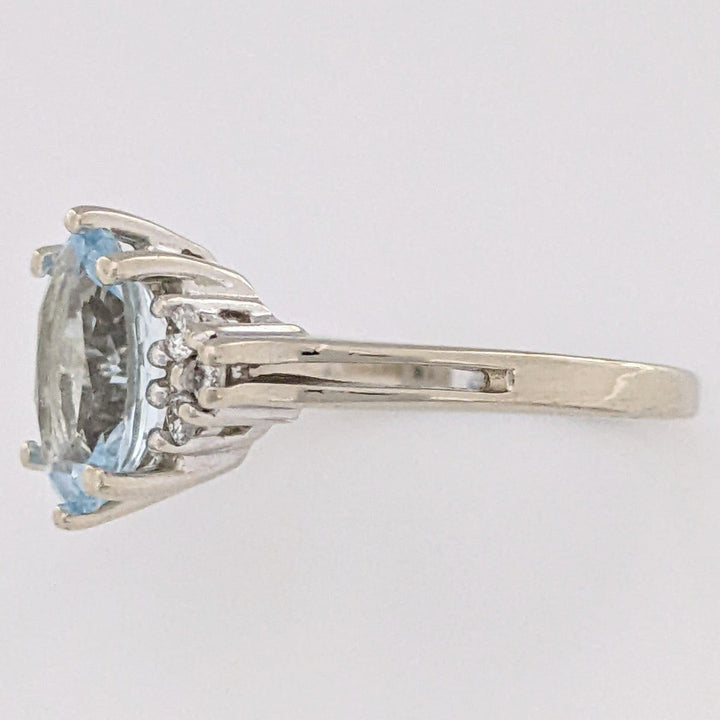 14K WHITE AQUAMARINE "AA" OVAL 7X9 WITH .12 DIAMOND TOTAL WEIGHT ESTATE RING 3.0 GRAMS