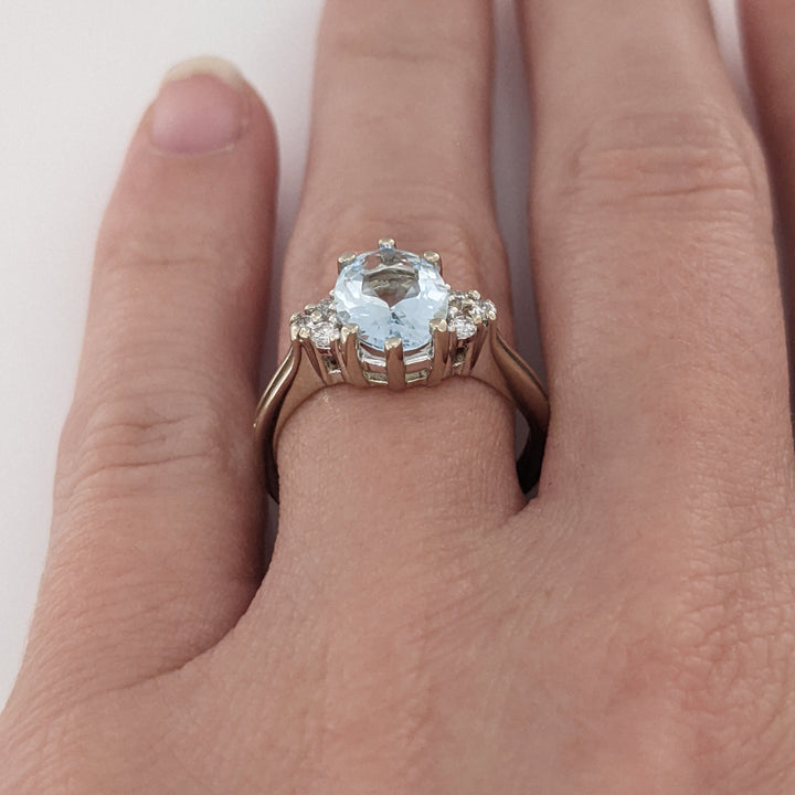 14K WHITE AQUAMARINE "AA" OVAL 7X9 WITH .12 DIAMOND TOTAL WEIGHT ESTATE RING 3.0 GRAMS