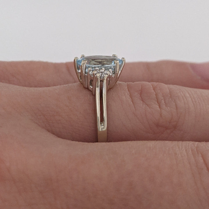 14K WHITE AQUAMARINE "AA" OVAL 7X9 WITH .12 DIAMOND TOTAL WEIGHT ESTATE RING 3.0 GRAMS