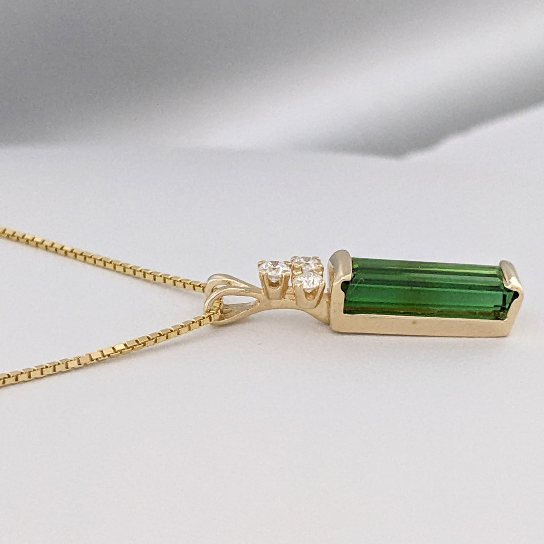 14K GREEN TOURMALINE EMERALD CUT 5X13 WITH .18 DIAMOND TOTAL WEIGHT ESTATE PENDANT & CHAIN 4.6 GRAMS
