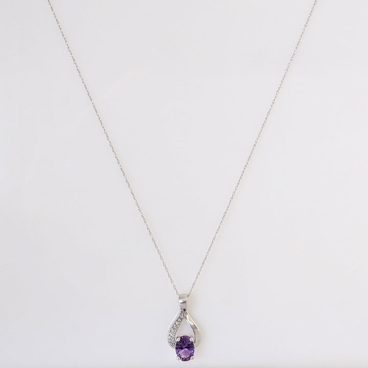 10K WHITE AMETHYST OVAL 6X8 WITH MELEE TWIST ESTATE PENDANT & CHAIN 1.7 GRAMS