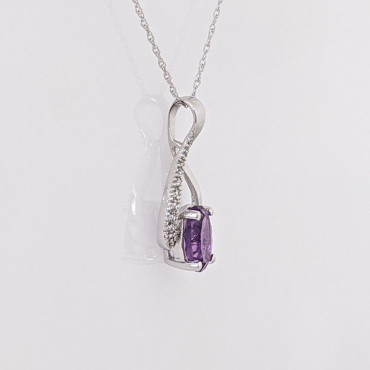10K WHITE AMETHYST OVAL 6X8 WITH MELEE TWIST ESTATE PENDANT & CHAIN 1.7 GRAMS