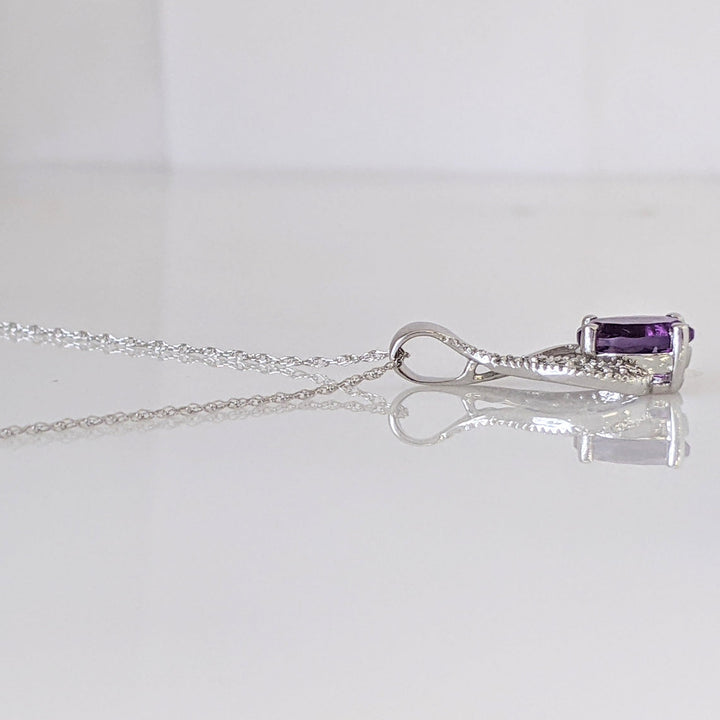 10K WHITE AMETHYST OVAL 6X8 WITH MELEE TWIST ESTATE PENDANT & CHAIN 1.7 GRAMS