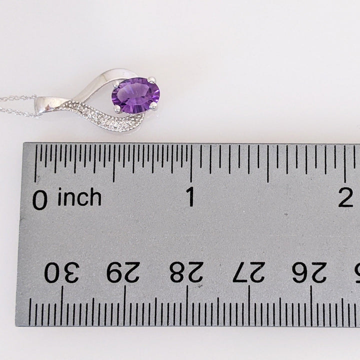 10K WHITE AMETHYST OVAL 6X8 WITH MELEE TWIST ESTATE PENDANT & CHAIN 1.7 GRAMS