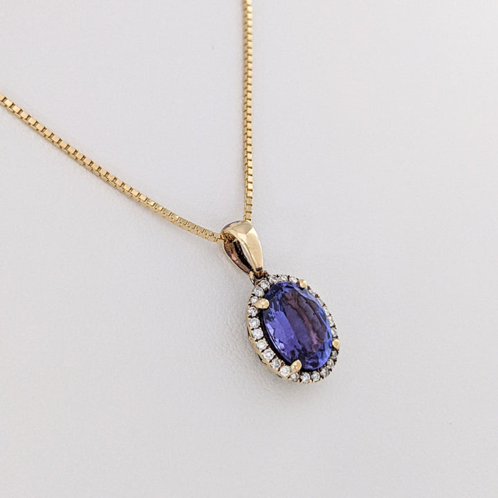 14K TANZANITE OVAL 7X9 "AAA" WITH .20 DIAMOND TOTAL WEIGHT HALO ESTATE PENDANT & CHAIN 3.4 GRAMS