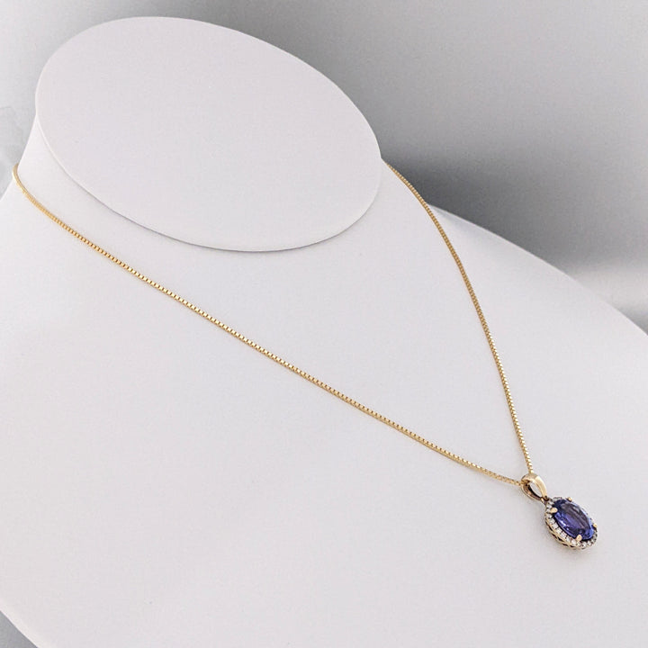 14K TANZANITE OVAL 7X9 "AAA" WITH .20 DIAMOND TOTAL WEIGHT HALO ESTATE PENDANT & CHAIN 3.4 GRAMS