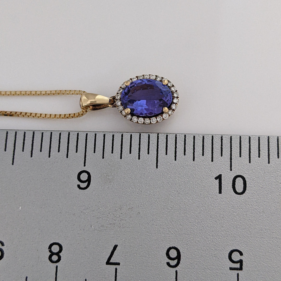 14K TANZANITE OVAL 7X9 "AAA" WITH .20 DIAMOND TOTAL WEIGHT HALO ESTATE PENDANT & CHAIN 3.4 GRAMS