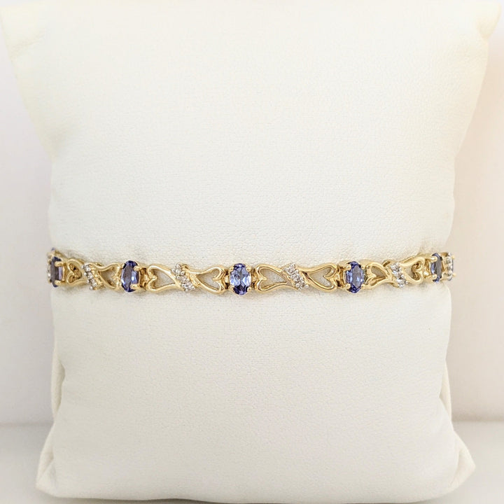 14K TANZANITE OVAL (11) 3X5 WITH .33 DIAMOND TOTAL WEIGHT (33) ESTATE BRACELET 10.5 GRAMS
