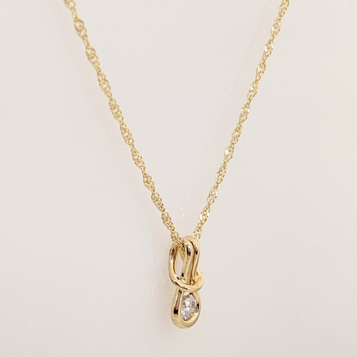 14K .16 CARAT TOTAL VS1 I DIAMOND ROUND LOVE KNOT ESTATE PENDANT & CHAIN 1.9 GRAMS