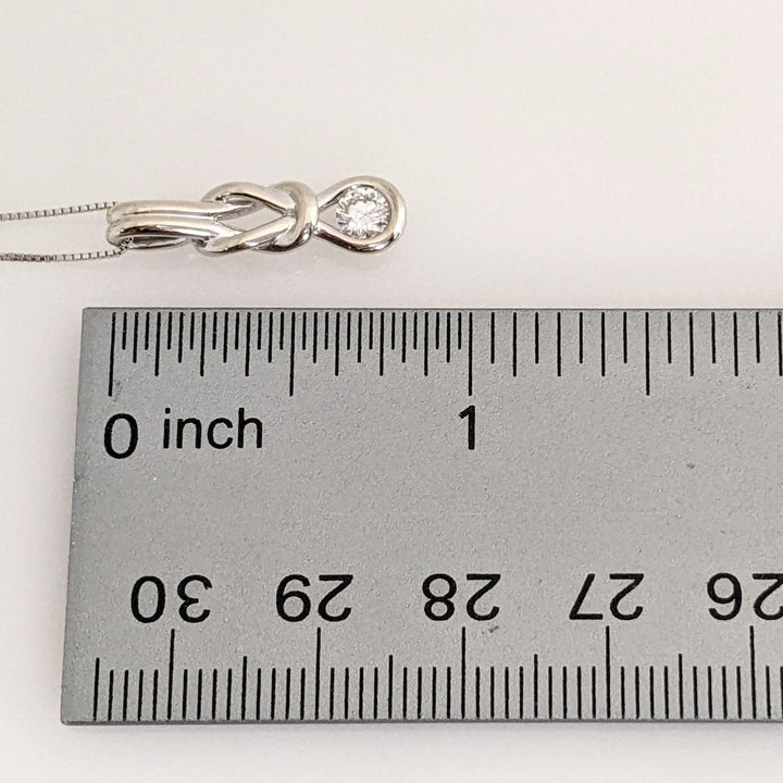 10K WHITE .25 CARAT TOTAL I1 I DIAMOND ROUND LOVE KNOT ESTATE PENDANT & CHAIN 2.5 GRAMS